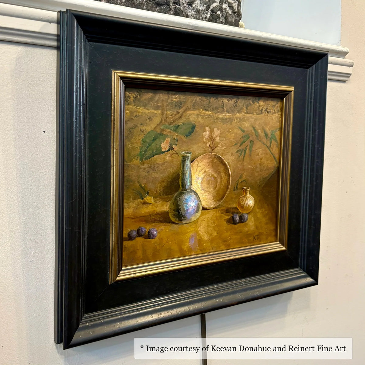 Realistic still life painting by Keevan Donahue in a wide black and gold frame, exhibited at Reinert Fine Art.