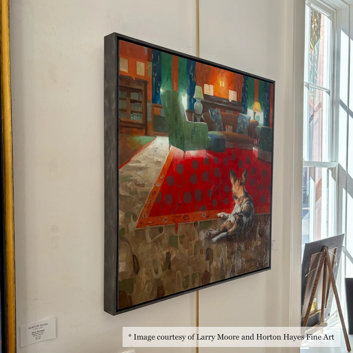 Surrealist interior scene by Larry Moore, framed in ebonized wood floater frame at Horton Hayes Fine Art, Kiawah.