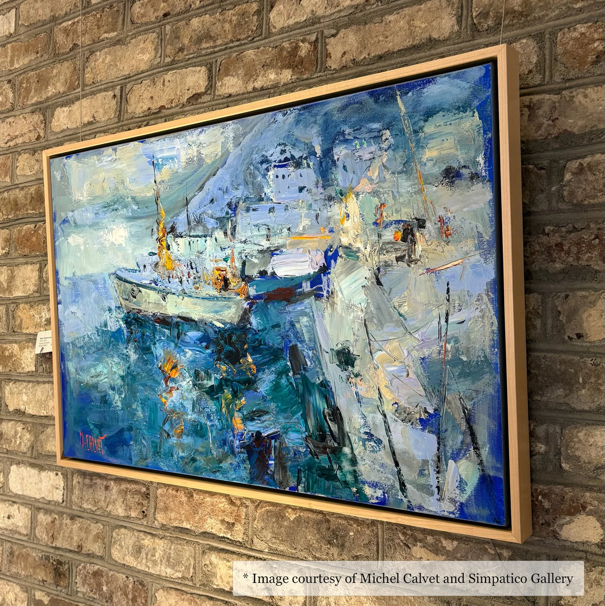 Impressionist harbor scene painting by Michel Calvet, framed in a natural maple floater frame from Simpatico Gallery, Newbury. Featuring boats and water.