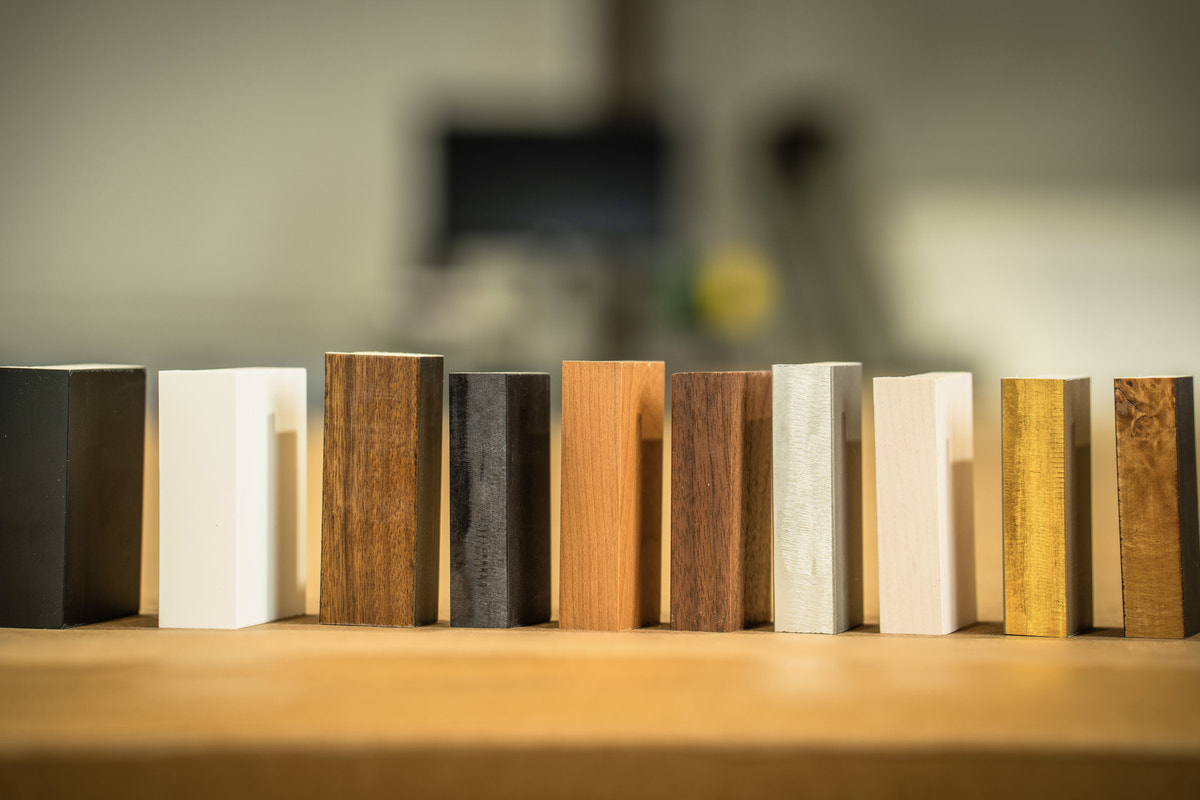 Modern Frame Chip Sample Pack: ten solid wood moulding samples in black, white, walnut, cherry, silver, maple, gold and burl