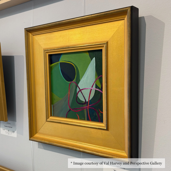 Abstract artwork by Val Harvey, framed in a wide gold frame, at Perspective Gallery, Vendue.